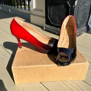 Red and black heels with RED BOTTOMS